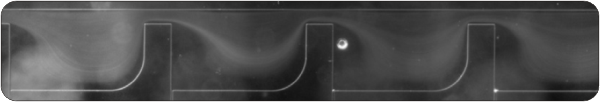 Particle trajectories in geometric singularities